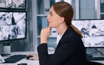 Case files and evidence documents on an investigator's desk